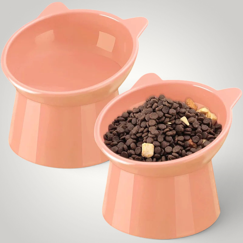 HappiFinds set of two pink elevated cat bowls with cute cat-ear shaped rims to reduce neck strain during mealtime.