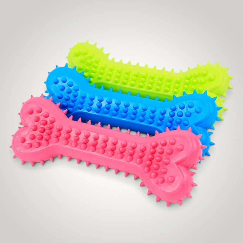 HappiFinds soft rubber bone-shaped dog chew toys in bright pink, blue, and lime green with textured nubs