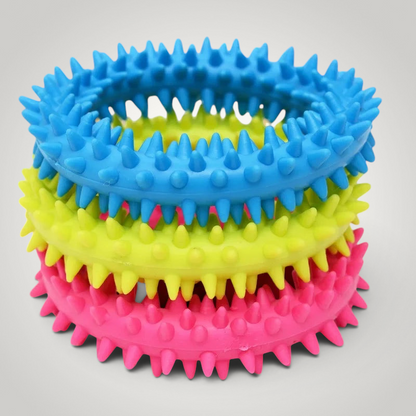 HappiFinds soft rubber ring chew toys for small dogs in blue, yellow, and pink with textured spikes