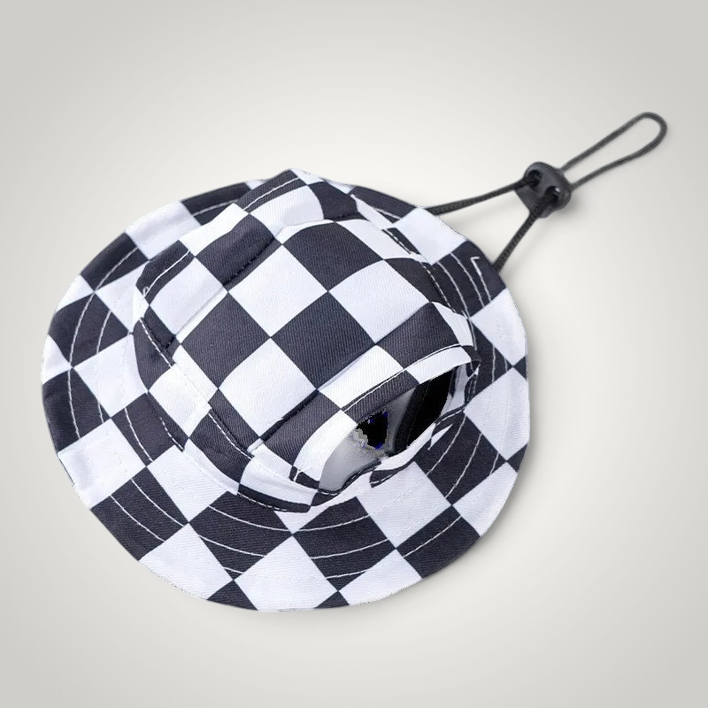 HappiFinds black and white checkered dog sun hat with an adjustable chin strap for outdoor pet sun protection