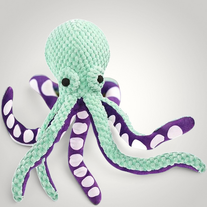 HappiFinds green and purple plush octopus dog toy with textured fabric and reinforced stitching for durable play.