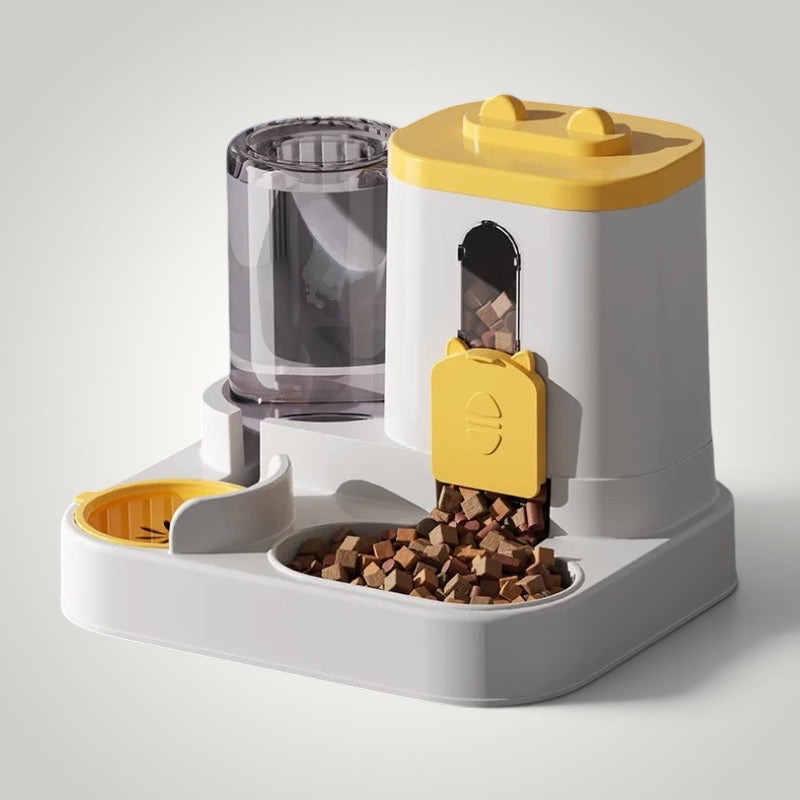 HappiFinds automatic pet feeder in white and yellow with a clear kibble container and dispensing tray for cats or dogs