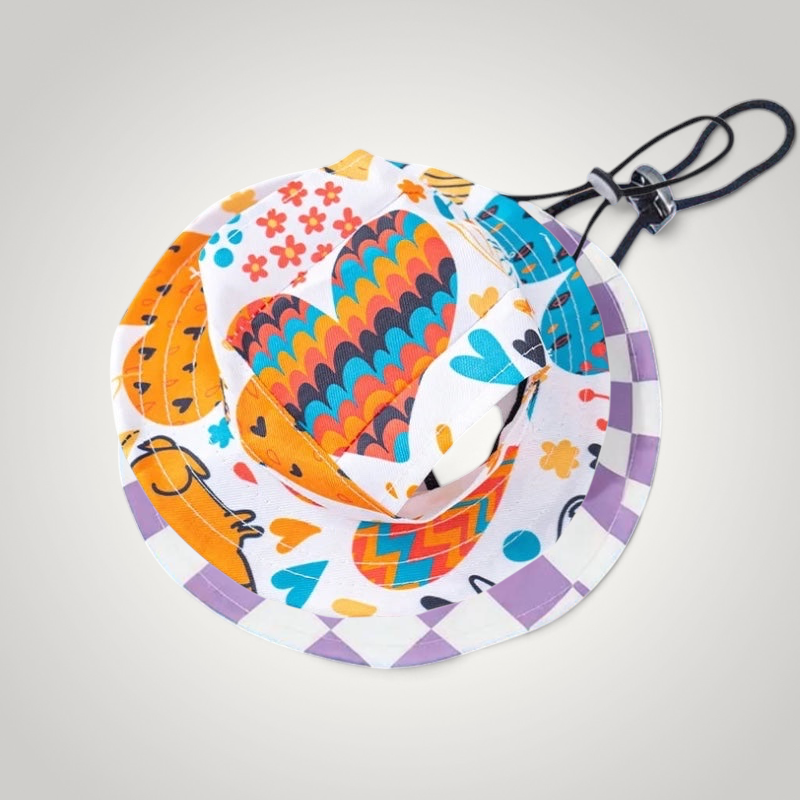 HappiFinds dog sun hat with a colorful heart and flower pattern, featuring an adjustable chin strap for pets.