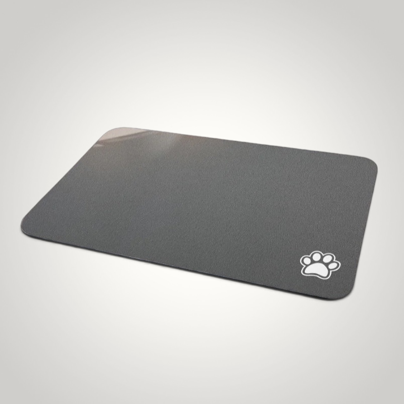 HappiFinds dark gray waterproof dog feeding mat with a white paw print design and non-slip rubber backing.