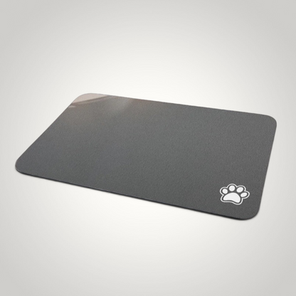 HappiFinds dark gray waterproof dog feeding mat with a white paw print design and non-slip rubber backing.