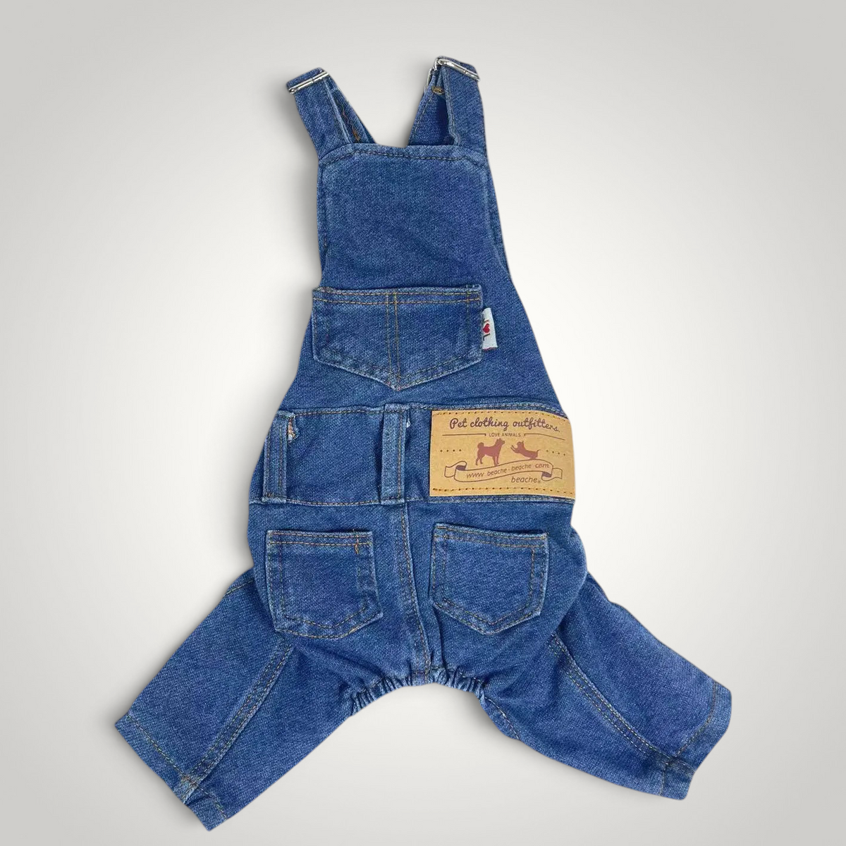 HappiFinds blue cotton-denim dog overalls with adjustable straps and back pockets for a comfortable pet outfit