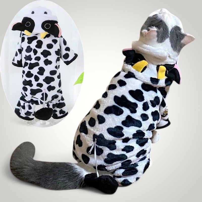 HappiFinds plush cow print dog jumpsuit with a hooded animal face and tail for cozy pet winter wear