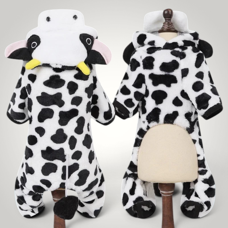 HappiFinds cow-patterned plush fleece dog jumpsuit with a hooded animal face and tail for small to medium pets.