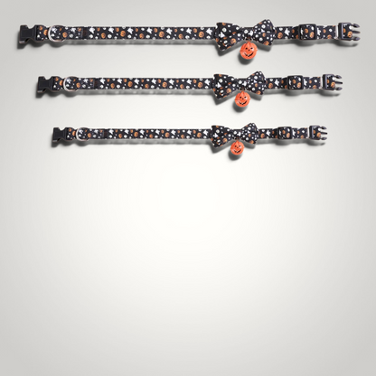 HappiFinds Halloween cat collars in black with pumpkin and ghost print, featuring a bow tie and pumpkin jingle bell.