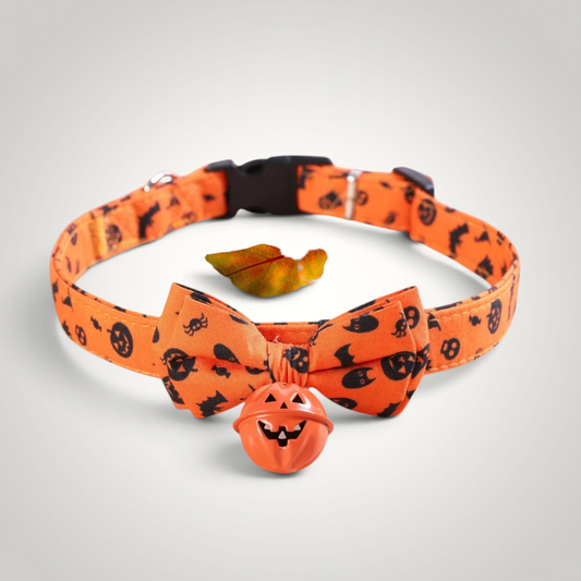 HappiFinds orange Halloween cat collar featuring a bow tie, pumpkin jingle bell, and black spooky pattern print.