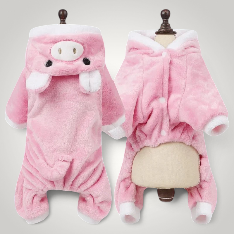 HappiFinds pink plush pig dog pajama jumpsuit with a hooded animal face and white trim details on a mannequin.