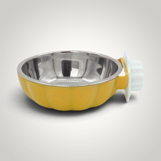 HappiFinds yellow pumpkin-shaped pet bowl with a stainless steel interior and a screw-on cage mounting mechanism.