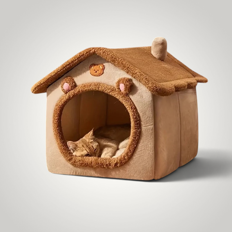 HappiFinds tea brown foldable pet house with a plush roof and cute bear-themed details, occupied by a sleeping cat.